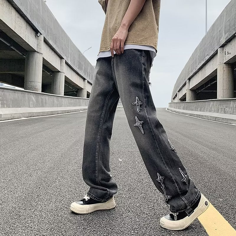Ripped Cross Denim Jeans