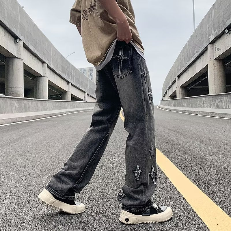 Ripped Cross Denim Jeans