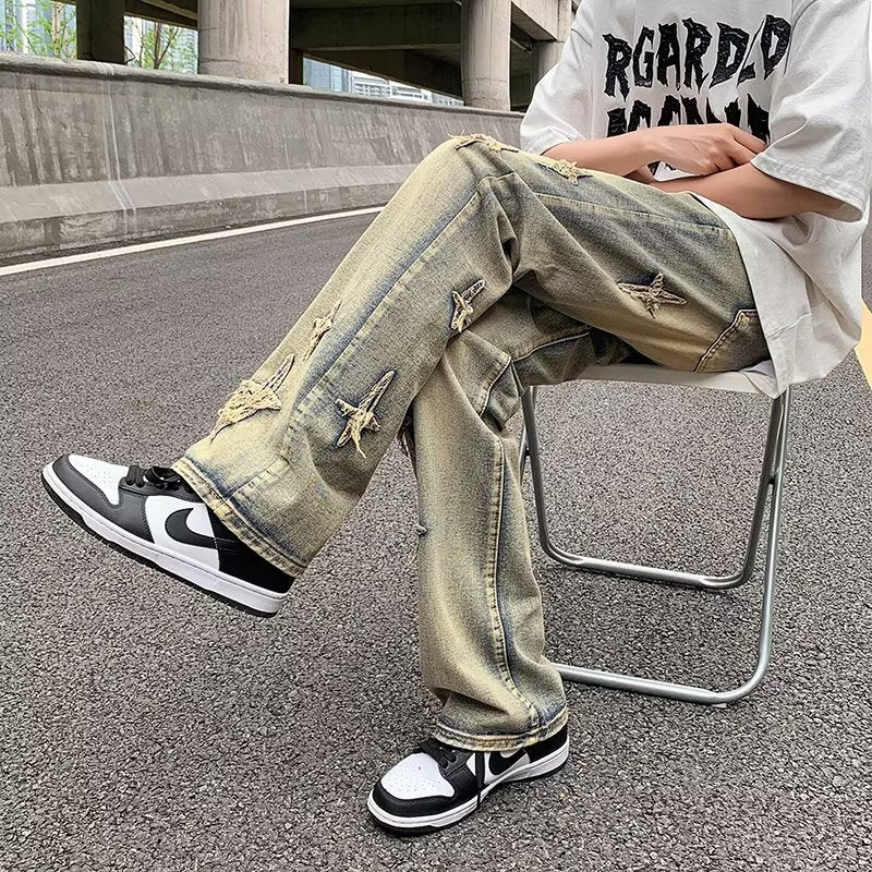 Ripped Cross Denim Jeans